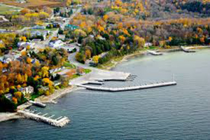 An aerial view of a dock in the Village of Egg Harbor. Bridges extend out into the water.